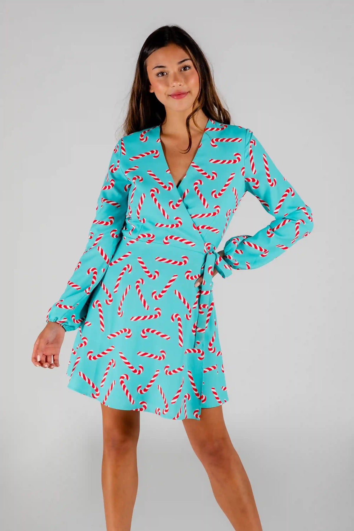 The Peppermint Pimp Canes | Candy Cane Print Christmas Wrap Dress