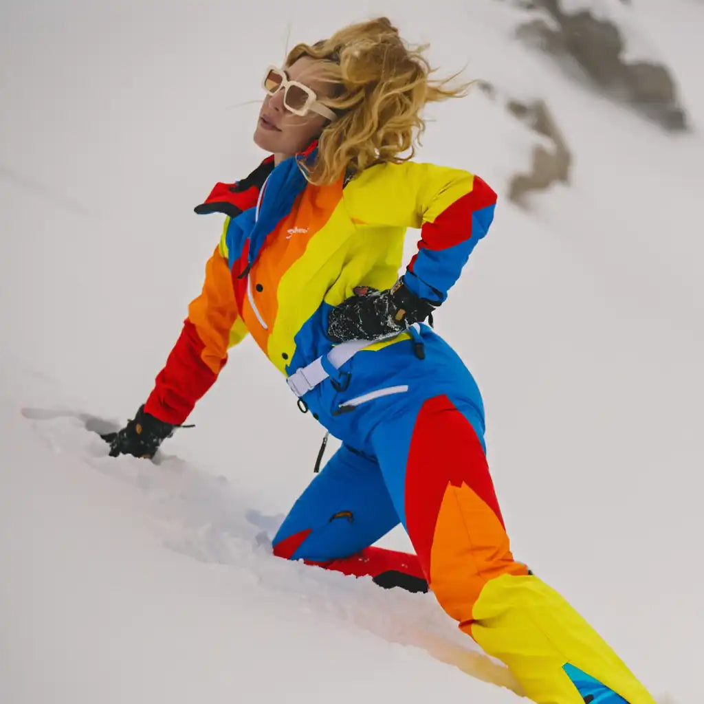 The Groovy Gondola | Orange Retro Swirl Women's One Piece Ski Suit