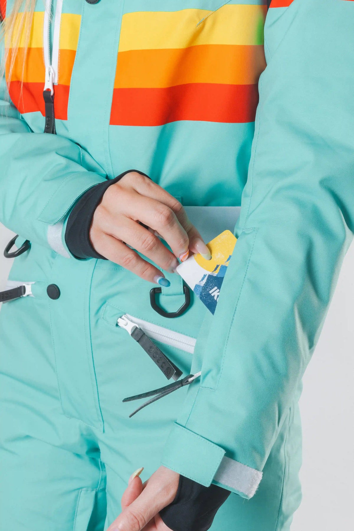 The Midday Aprés | Teal and Orange Retro Stripe Women's One Piece Ski Suit